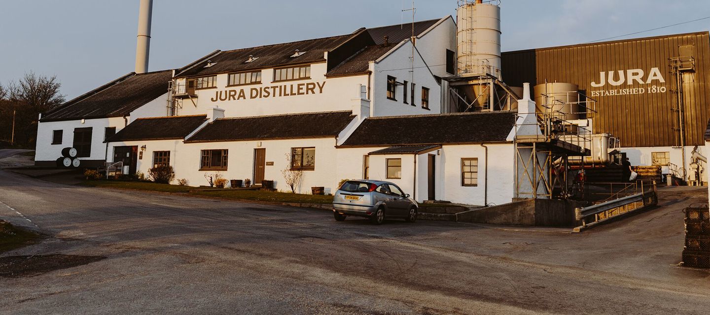 Large Jura Distillery At Sunset April